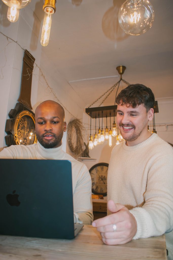 photo of co-founders on computer